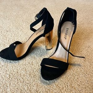 Gold and black Heels